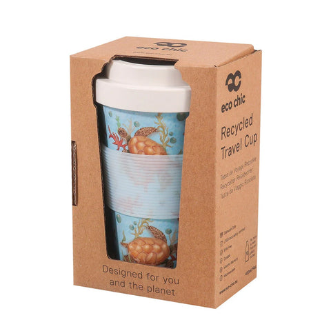 Recycled travel cup in eco-chic packaging on a white background