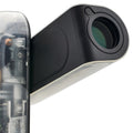 Close-up of a black telescope device with a lens 