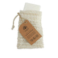 Bar of soap in a natural fiber pouch with a brown tag on a white background