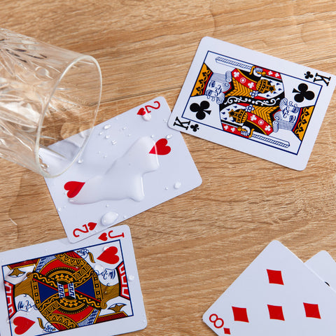 Water spilt on waterproof playing cards