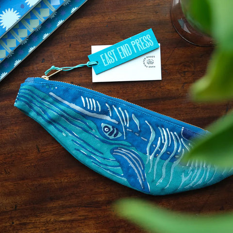 Blue pouch with whale design featuring East End Press tag.