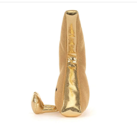 A gold-colored plush toy shaped like a lightning bolt