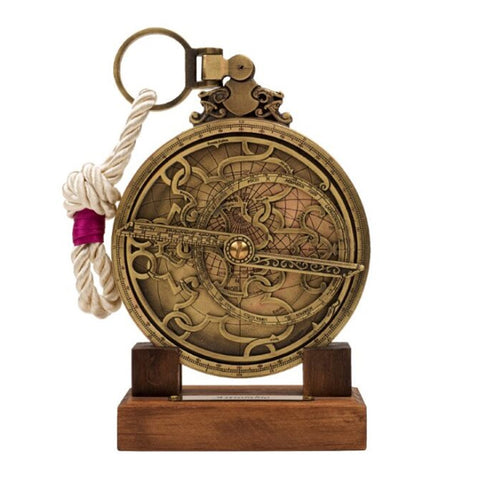 Brass and rope astrolabe on a wooden base.