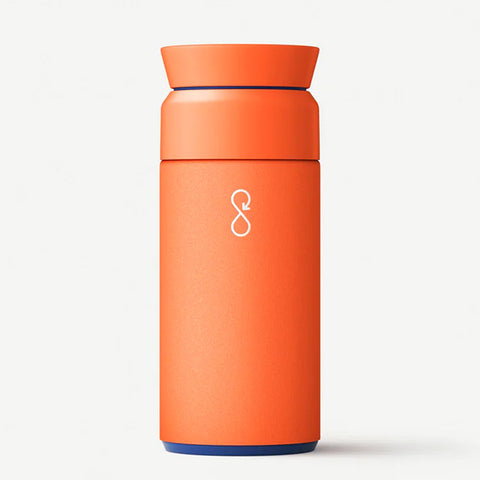 Orange flask with white logo.