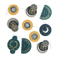 A string of celestial-themed paper garlands featuring moon phases, stars, and geometric patterns in teal, mustard yellow, cream, and navy blue. 