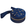 Round navy fabric jewellery holder with a gold zip and gold constellation design.