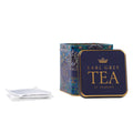 Tea tin labelled 'Earl Grey Tea' with tea bags 