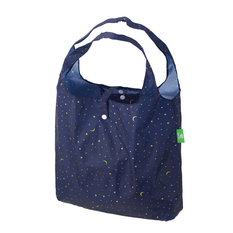Navy blue tote bag with celestial pattern on a white background