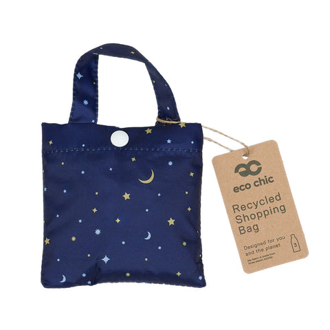 Navy blue recycled shopping bag with star and moon pattern and 'eco chic' tag.