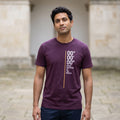 man wearing a purple Prime Meridian T-Shirt