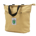 Beige tote bag with black handles and a visible brand label on 