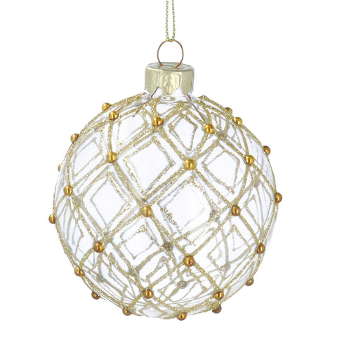 Clear glass bauble with gold lattice docoration.