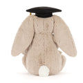 Plush bunny toy wearing a black graduation cap