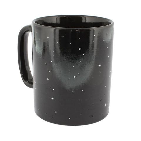 Black mug with small silver stars.