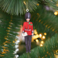 a King's Guard soldier hanging decoration in a Christmas tree