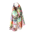 Silky neck scarf with bright, multi-colour tropical leaves print