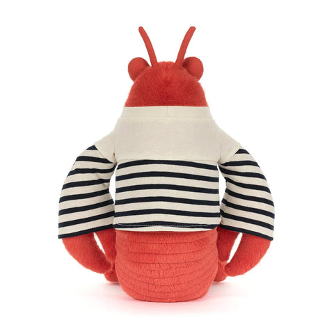 Plush toy lobster with red body, white and black striped jumper