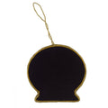 Black silhouette ornament with gold trim 