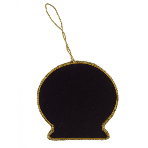 Black silhouette ornament with gold trim 