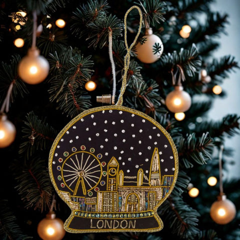 London skyline embroidered with gold thread and coloured beads decoration on a Christmas tree. London Eye, Tower Bridge and The Shard.