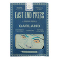 Packaged product from East End Press with a face design on a blue background