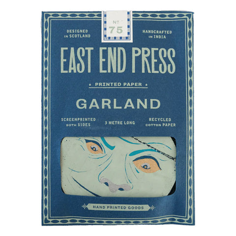 Packaged product from East End Press with a face design on a blue background