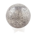 Moon sphere with textured surface on a clear stand