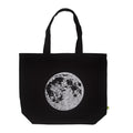 Black tote bag with a silver moon graphic on