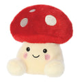 Red and white mushroom plush with a smiley face.