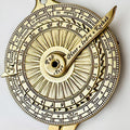 Brass nocturnal with  months and numbers on the dials