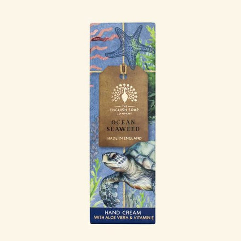 Hand cream packaging with ocean-themed design featuring a turtle and starfish on a beige background.