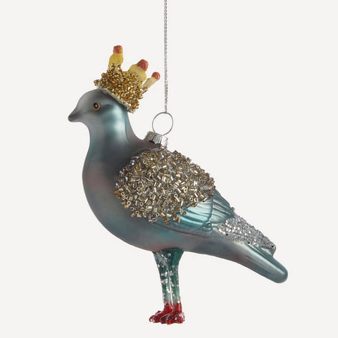 Silver and sparkles pigeon in a crown tree decoration.