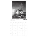 Calendar page for March with a black and white image of a ship in ice.