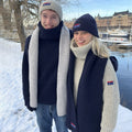 Two people wearing the Arthur Beale X National Maritime Museum range.