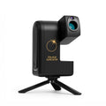 A black solar eclipse projector on a small tripod stand, featuring a gold sun graphic and the text 'TOTAL SOLAR ECLIPSE EDITION' on its side.