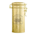 A vintage-style gold metal canister with embossed starburst patterns and a front label reading 'Cartwright Bakes & Butler' and 'Chocolate & Orange Shortbread Rounds,'