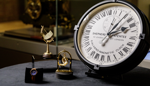 Shepherd Clock, H$ inspired pocket watch, Sundial and the Camden Watch Company GMT watch arranged stylistically in the Royal Observatory Greenwich Gallery 