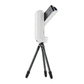 White smart telescope with black tripod 