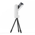 White smart telescope with a black tripod stand 