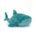 Teal plush whale toy with white spots 