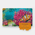 Children's book cover with a clownfish and coral illustration 