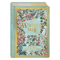 A Christmas greeting card designed to look like a book titled 'A Winter's Tale & Other Christmas Stories' featuring a light blue cover decorated with gold borders and detailed winter bird illustrations
