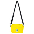 Yellow crossbody bag with a black strap on a white background