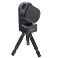 Black SeeStar50 telescope with tripod stand on a white background