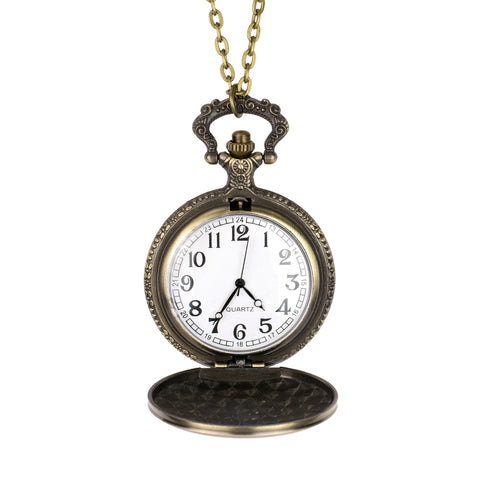 Bronze pendant necklace opened to reveal a black and white watch face.