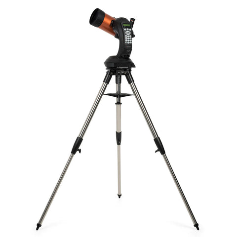 Orange and black telescope with control pad and tripod.