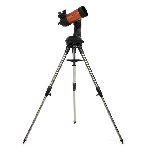 Orange and black telescope with control pad and tripod.