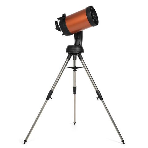 Orange and black telescope with tripod.