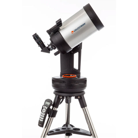 Grey and black telescope with control pad and tripod.