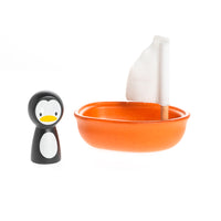 Orange Wooden Sailing Boat with Penguin Toy